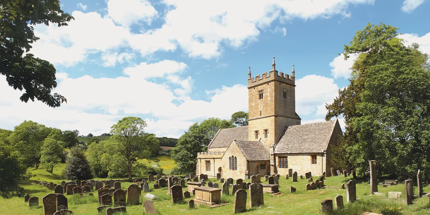 A traditional English parish church in its churchyard