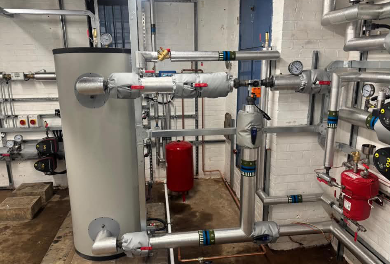 crematorium-plant-room-buffer-tank-controls.jpg New immersion-feed hot water cylinder in the crematorium's main plant room with associated pump sets